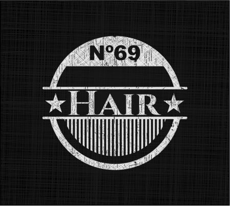 Hair chalkboard emblem written on a blackboard