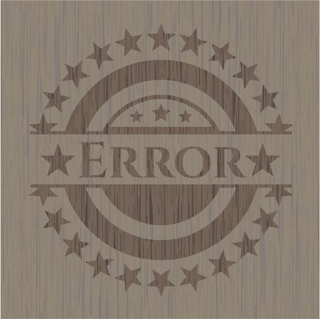 Error badge with wooden background