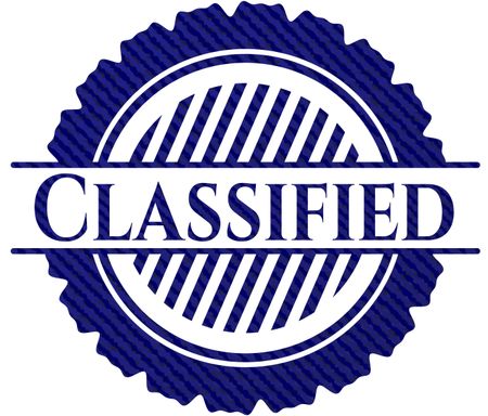 Classified badge with denim background