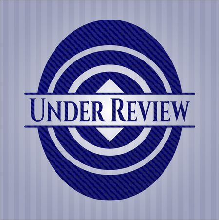 Under Review denim background