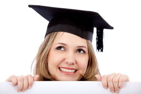 Graduation woman portrait smiling and holding a banner isolated on white