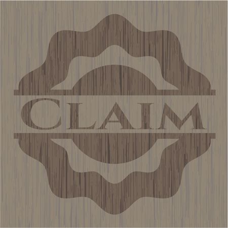 Claim badge with wooden background