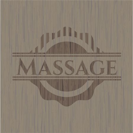 Massage badge with wooden background