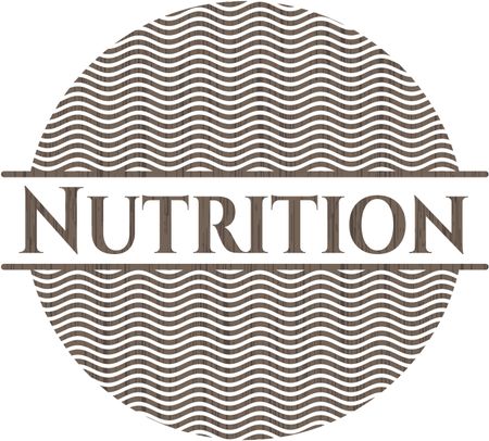 Nutrition badge with wooden background