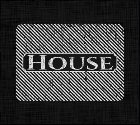 House chalkboard emblem on black board