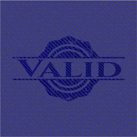 Valid emblem with denim high quality background