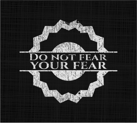 Do not fear your fear written on a chalkboard