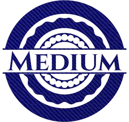 Medium badge with denim background