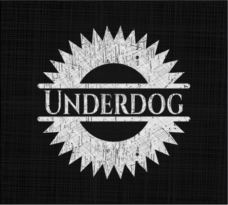 Underdog chalk emblem written on a blackboard