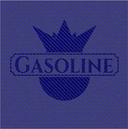 Gasoline badge with denim background
