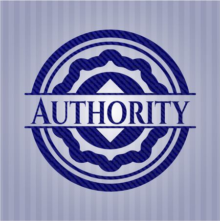 Authority badge with denim background