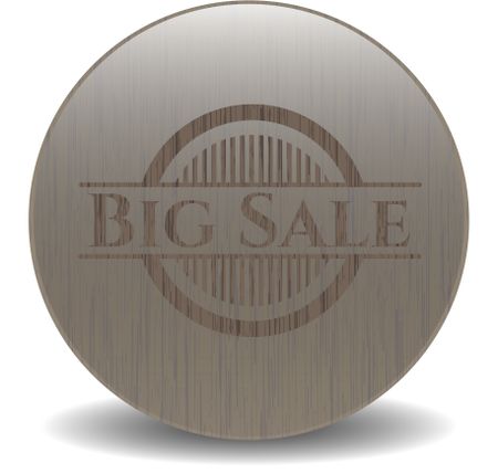 Big Sale badge with wooden background