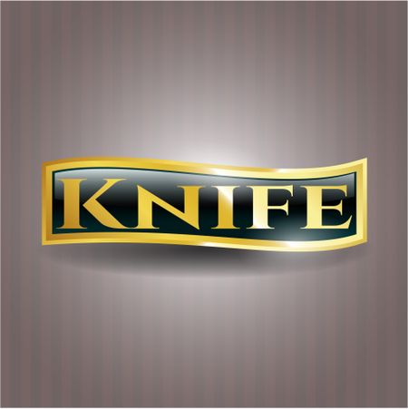 Knife golden emblem or badge