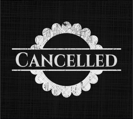 Cancelled written on a blackboard