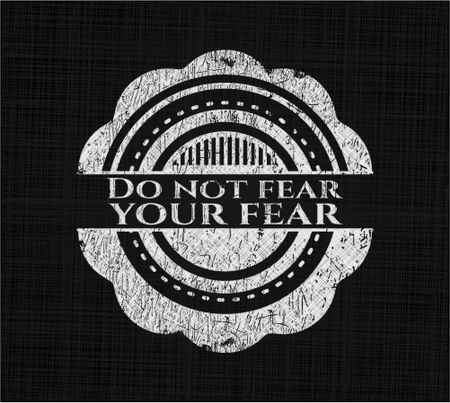 Do not fear your fear chalkboard emblem on black board