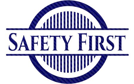 Safety First emblem with denim high quality background