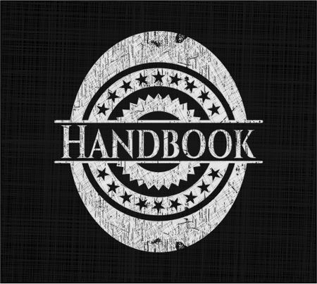 Handbook chalk emblem written on a blackboard
