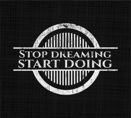 Stop dreaming start doing written on a blackboard