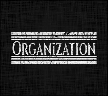 Organization chalkboard emblem written on a blackboard