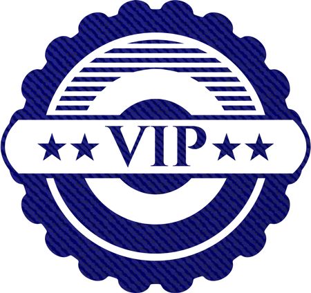 VIP badge with denim background