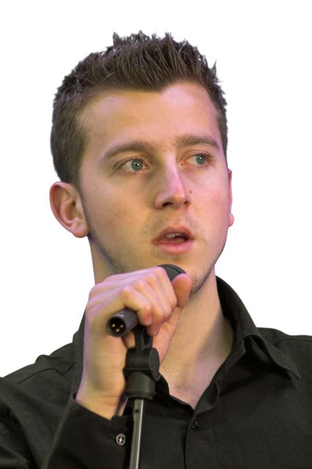 business man talking on a microphone