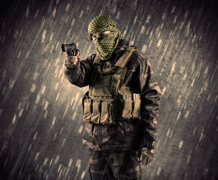 close-armed-terrorist-man-mask-rainy-446505739 Close up of an armed terrorist man with mask on rainy background