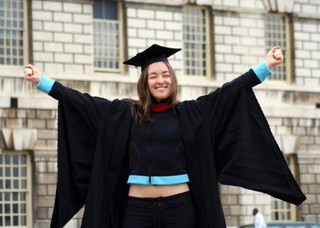 successful student celebrating her graduation