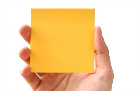 post it held by a hand over a white background