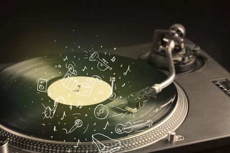 Turntable playing classical music with icon drawn instruments concept on background