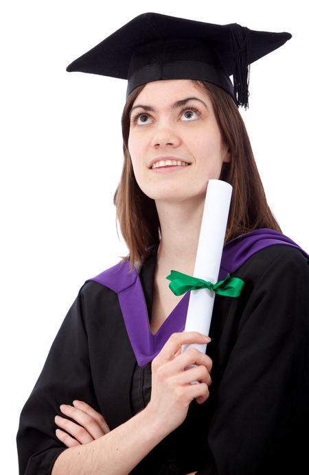 Pensive graduation woman isolated over a white background