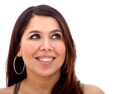 Thoughtful arabic woman smiling isolated over a white background