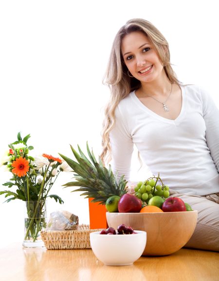 Healthy eating woman isolated over a white background