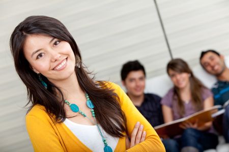 Beautiful casual woman with a group and smiling