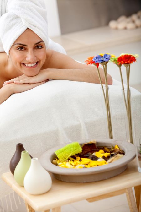 Woman at the spa with a towel on her head