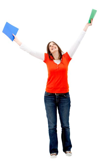 Happy female student with notebooks isolated over a white background