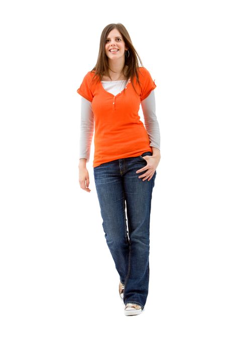 Fullbody casual woman woman walking, isolated over a white background