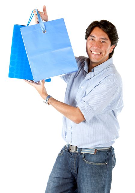 Man with shopping bags isolated over a white background