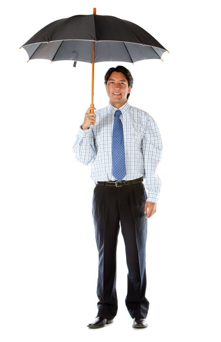 Business man under an umbrella isolated over a white background