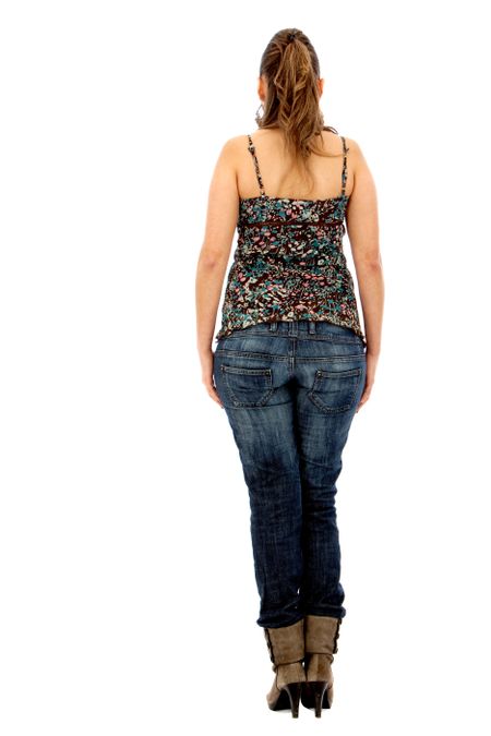 Full body casual woman from behind isolated over a white background