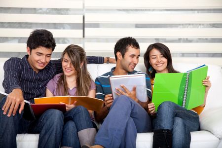 Group of young people studying at home