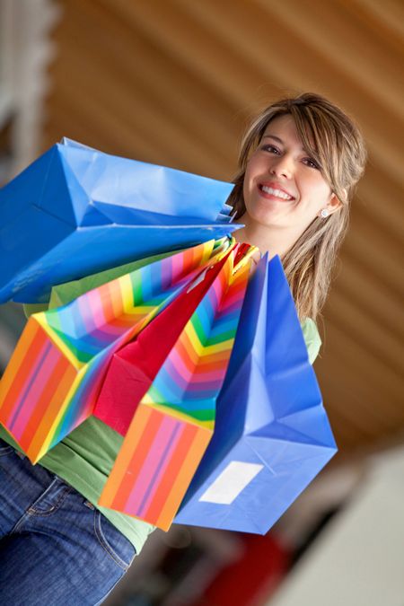 Beautiful woman with bags at a shopping center