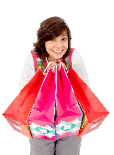 Woman with shopping bags isolated over a white background