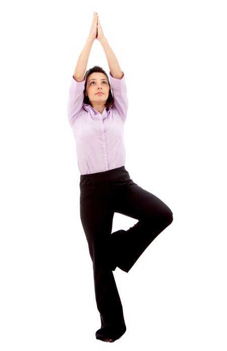 Business woman doing yoga isolated over a white background