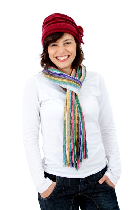 Happy woman with winter clothes isolated over a white background