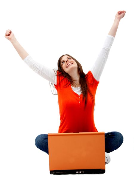 Happy student with a laptop isolated on white