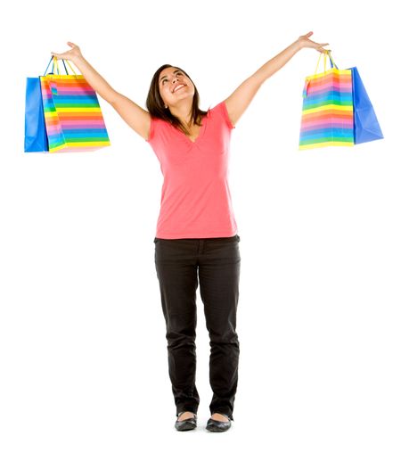 Happy shopping woman with arms open isolated on white