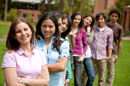 Group of casual people outdoors in a row