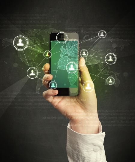 Caucasian hand in business suit holding a smartphone, social network concept