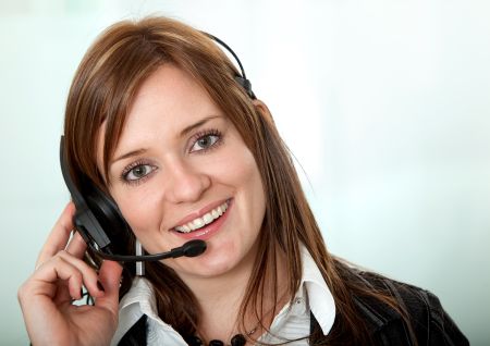 customer support operator woman smiling over a blue background