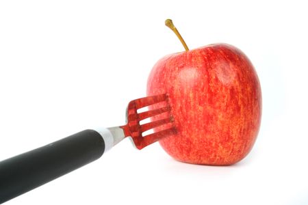 apple on a fork, perspective view